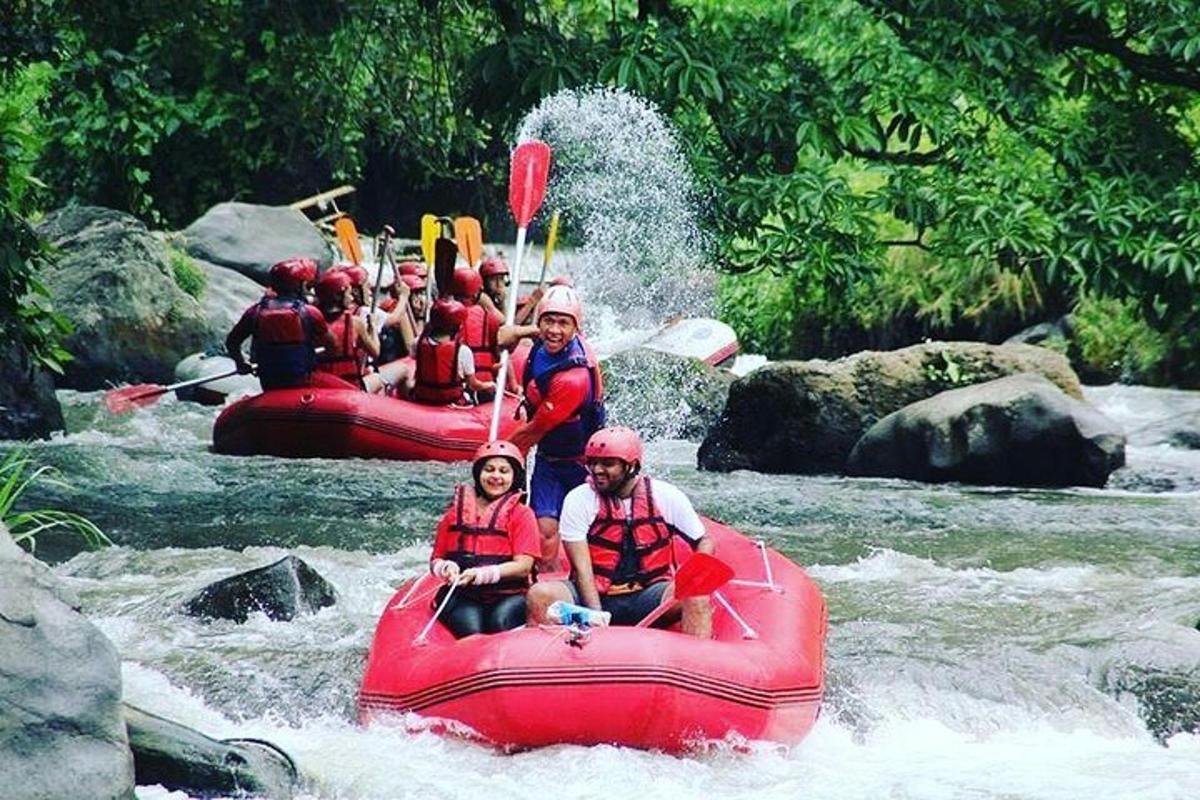 a group of people are rafting on a river
