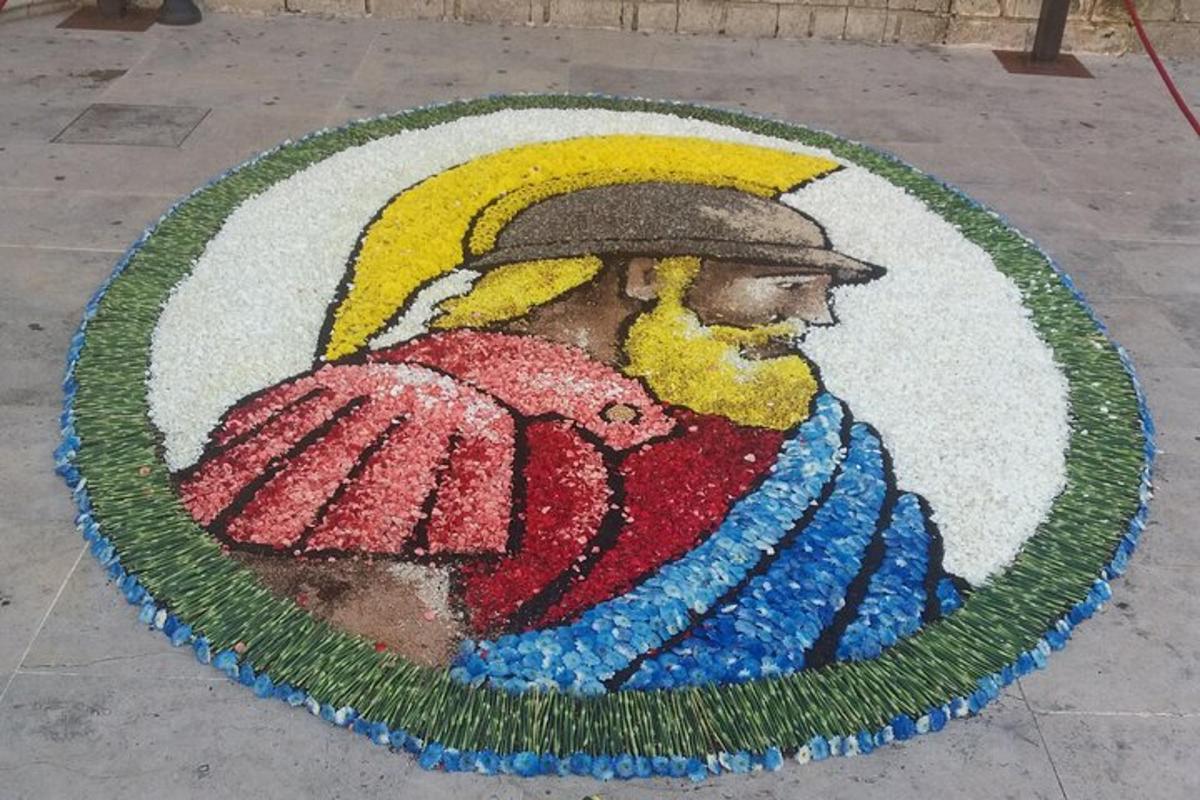 mozaik moškega, ki drži dežnik
