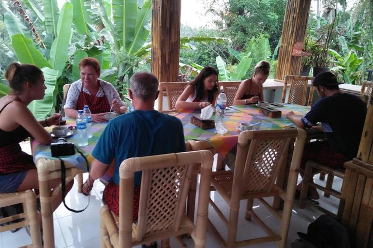 a group of people sitting around a table