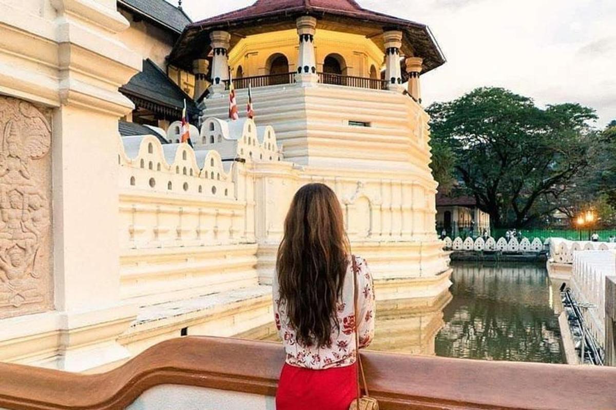 a woman standing in front of a building