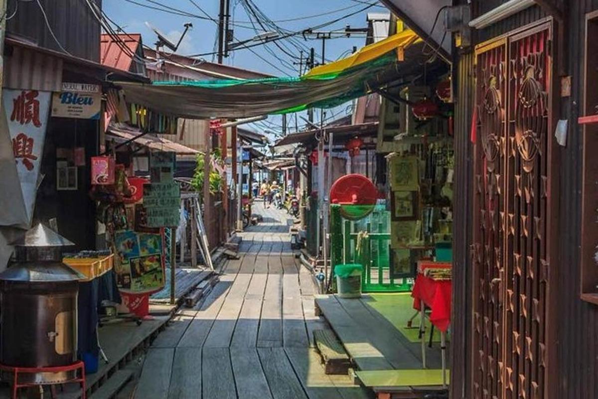 a street in an asian city with shops and buildings