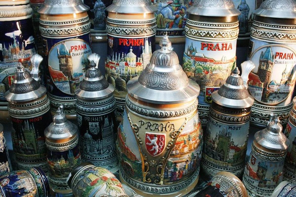 a large group of vases on display in a store