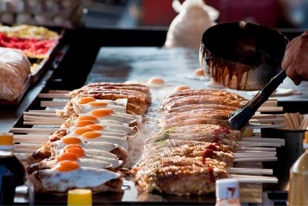 a bunch of food on a table with a spatula