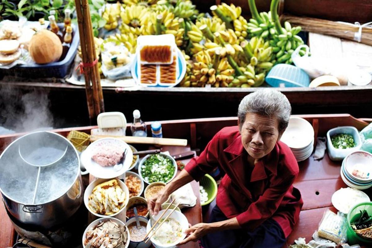 a man sitting in front of a buffet of food