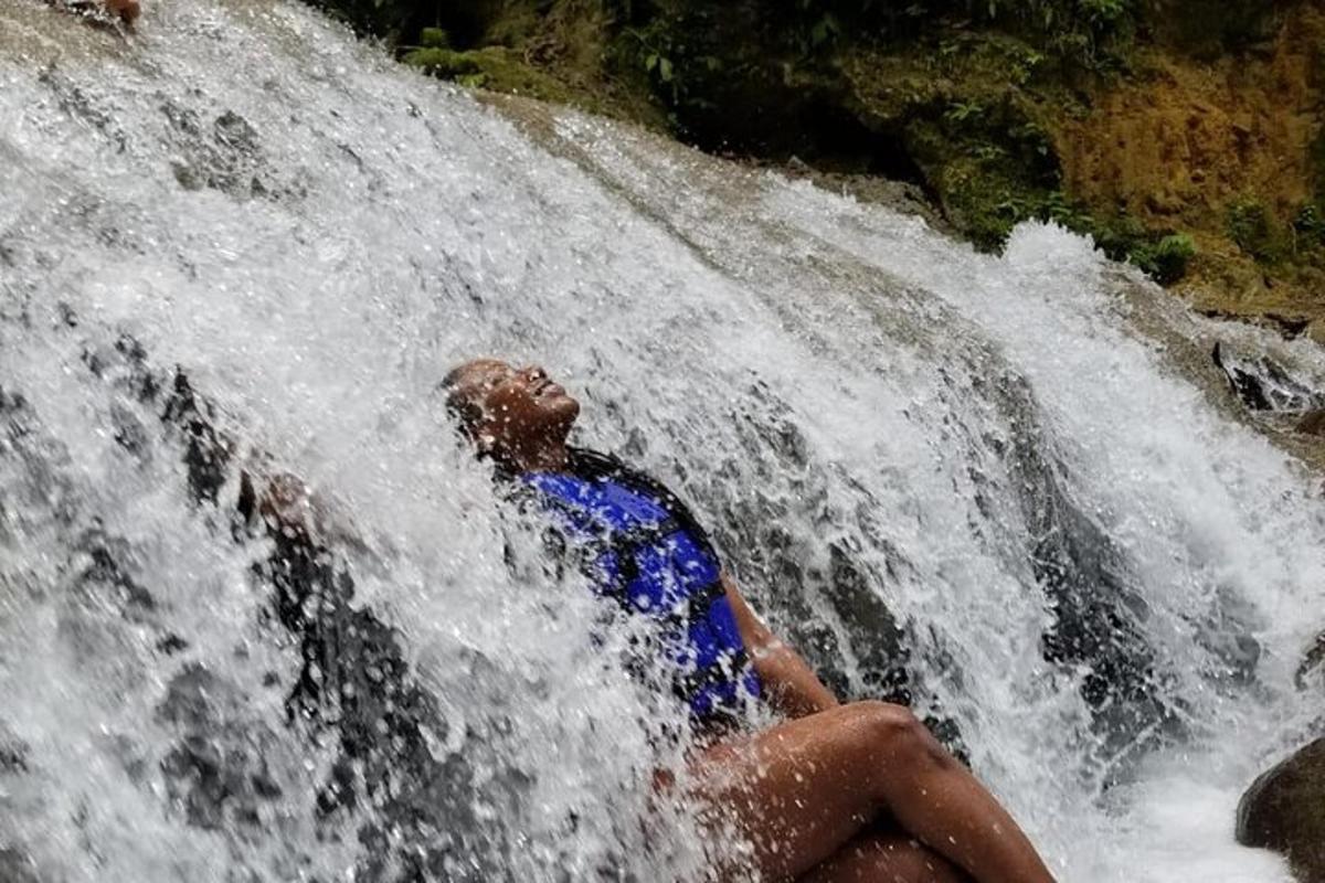 a man is in a waterfall