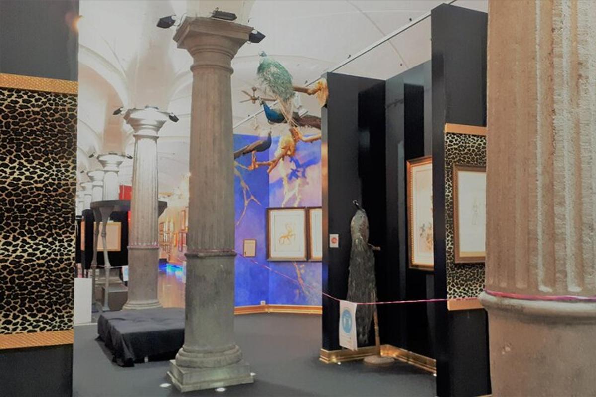 a room with a pillar and other items on display