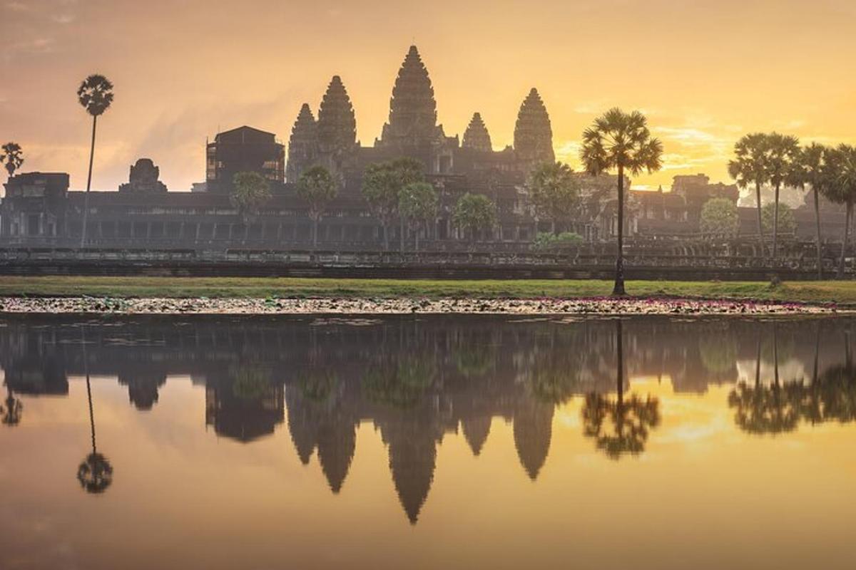 a view of a temple with a reflection in the water
