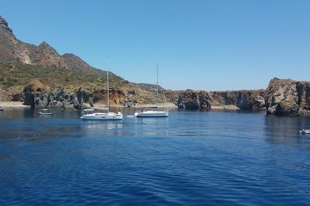 a group of boats sitting in a body of water