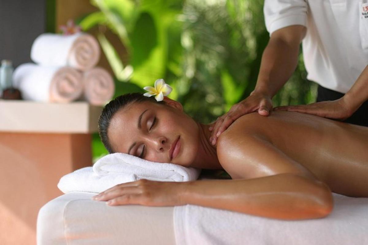 a woman getting a massage at a spa