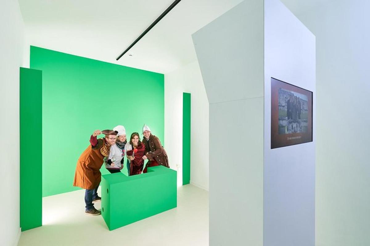 a group of people standing in a green wall