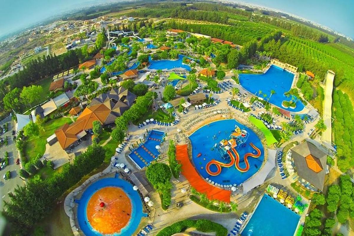 an overhead view of a water park with two pools