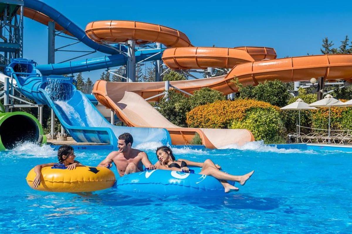 a group of three people riding on an inflatable