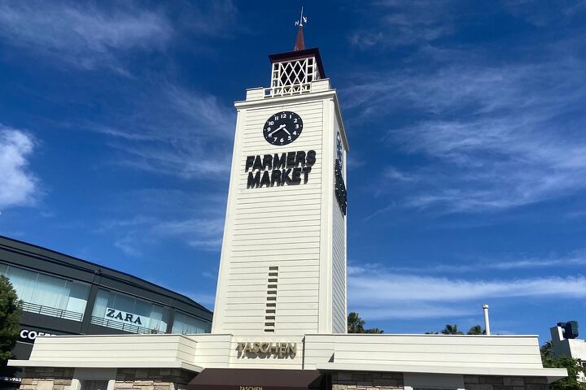 a clock tower in front of a building