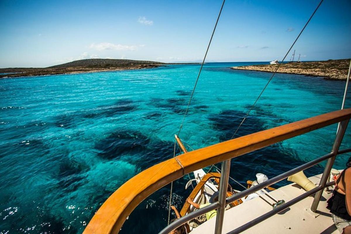 a view of the ocean from the bow of a boat