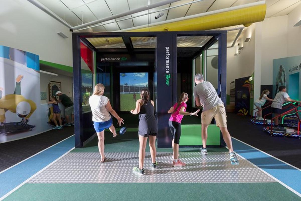 a group of people standing around in a gym