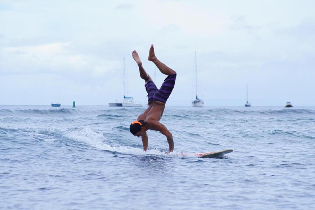 a person on a surfboard in the water