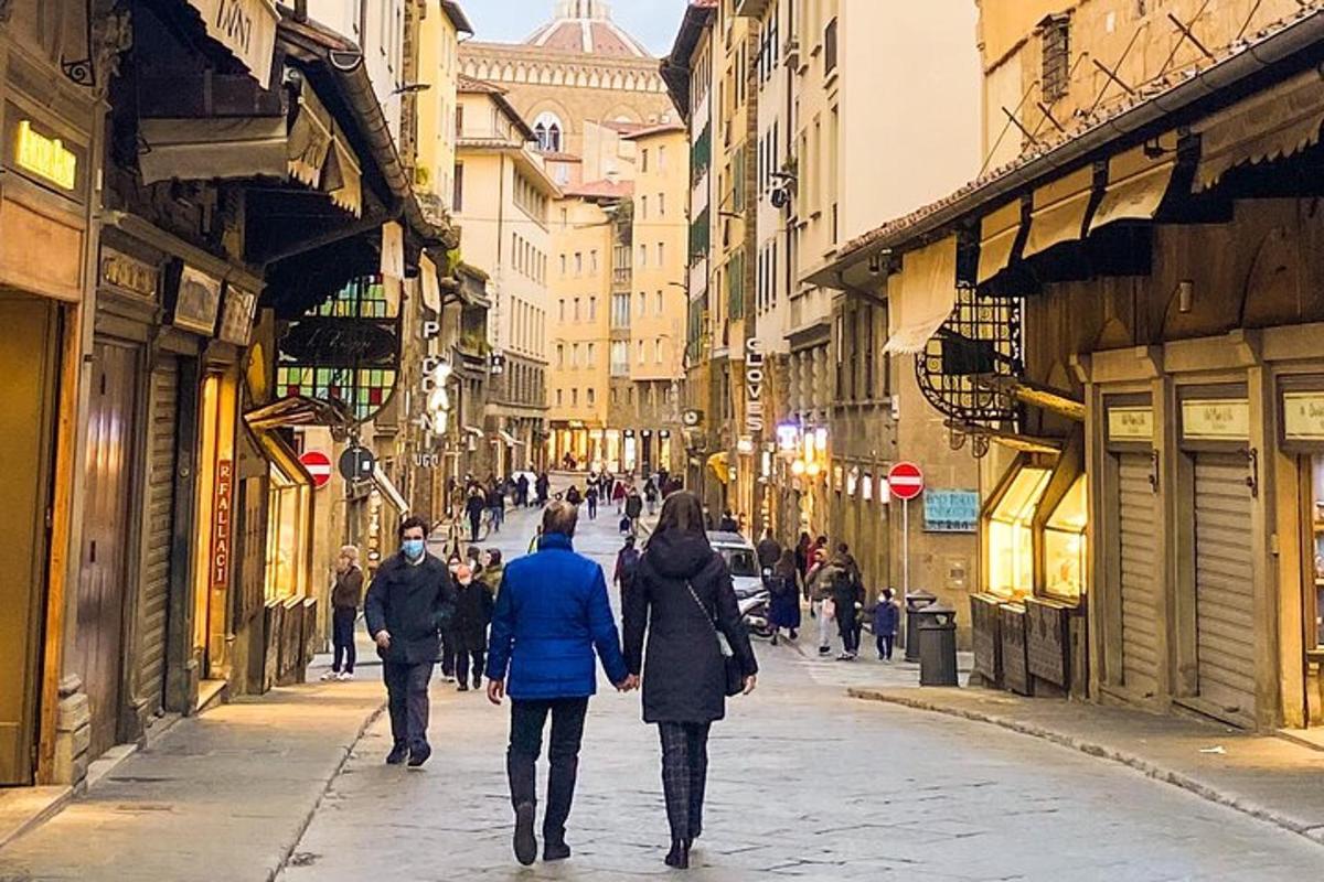 a group of people walking down a city street