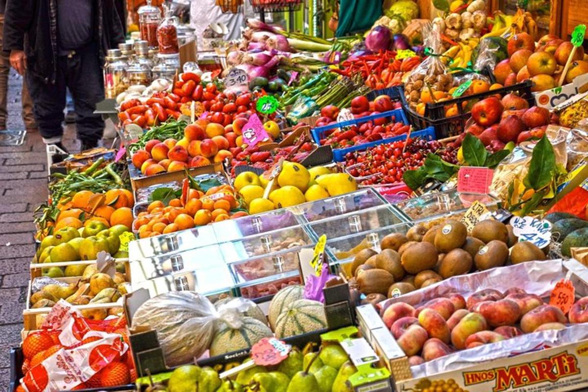 a market filled with lots of different fruits and vegetables