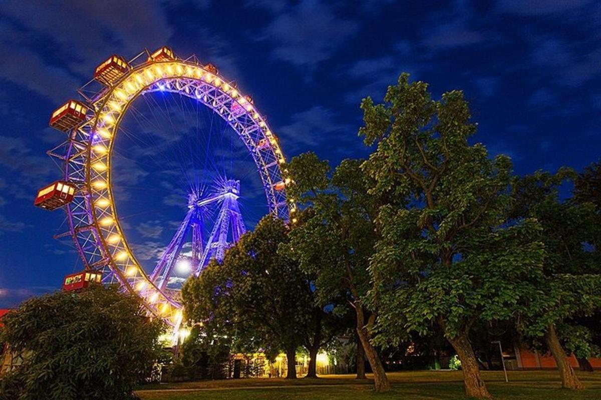 uma grande roda gigante iluminada à noite