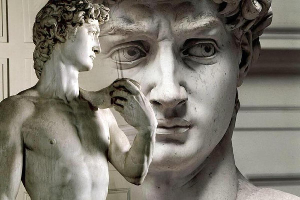 a statue of a woman talking on a cell phone