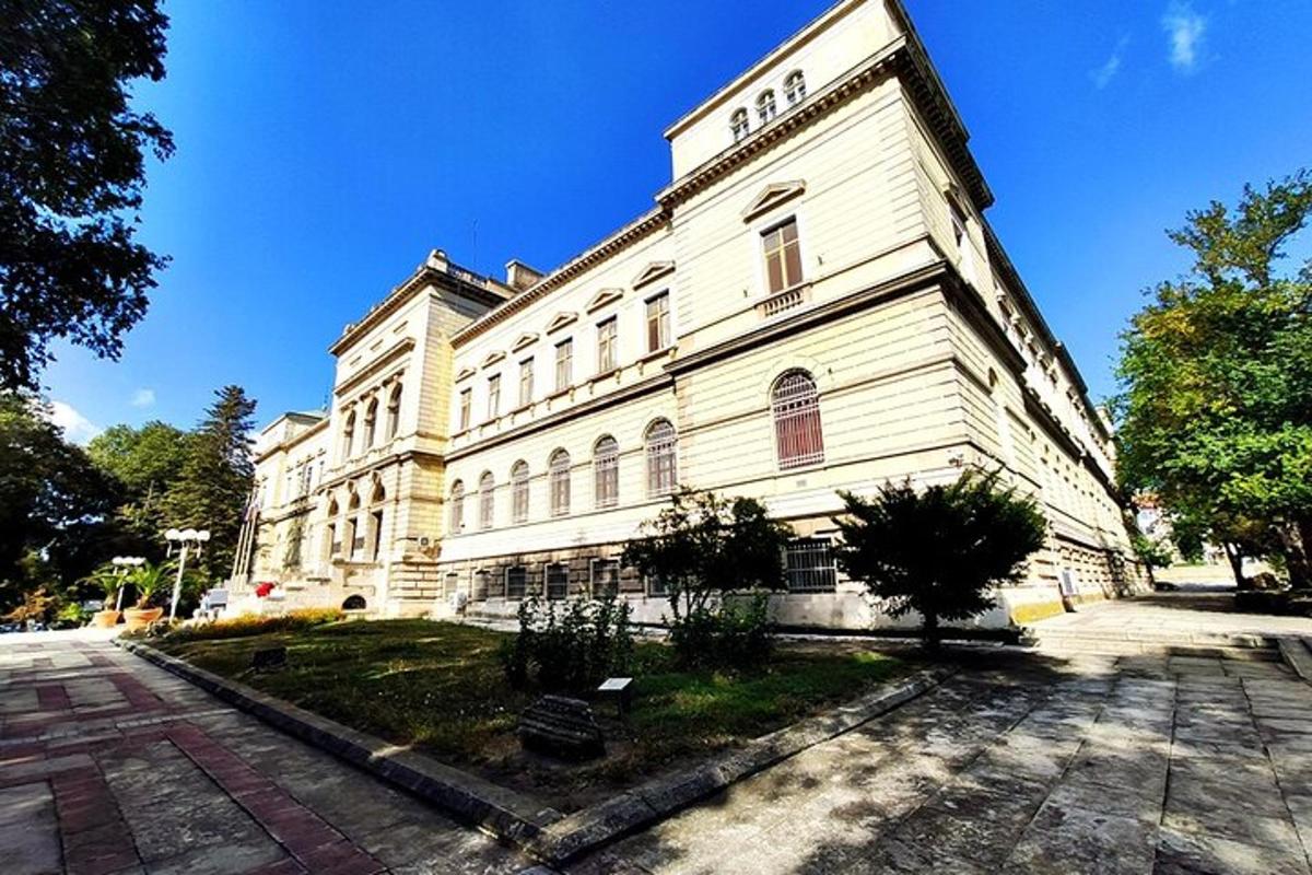 a large white building with aventh floor