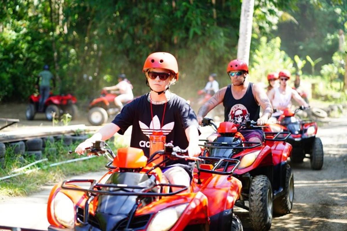 a group of people riding on motorcycles down a road