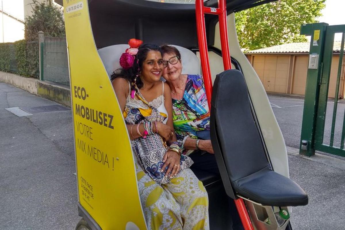 two women sitting in the back of a bus
