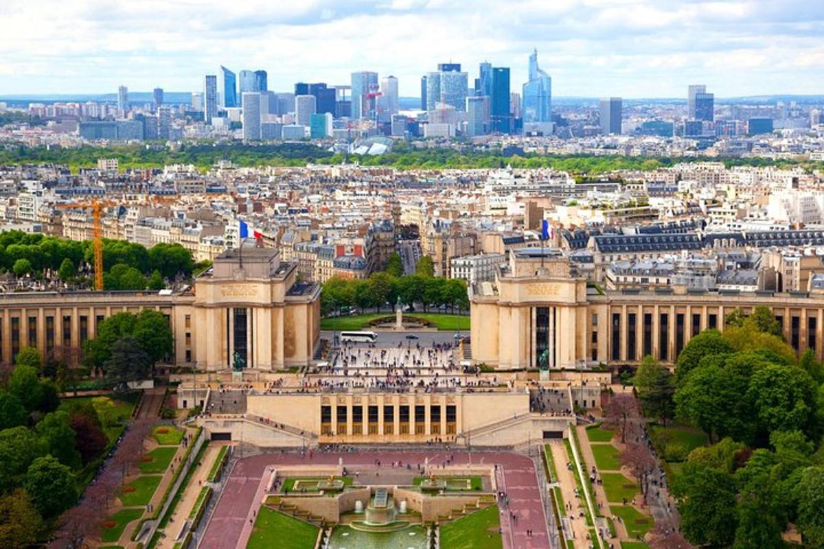 a view of a building with a city in the background