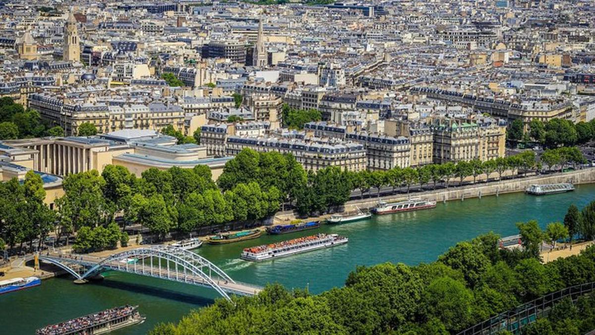 a view of a city with a river and a bridge