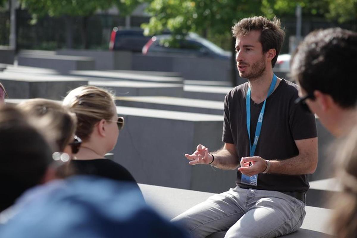 a man talking to a group of people
