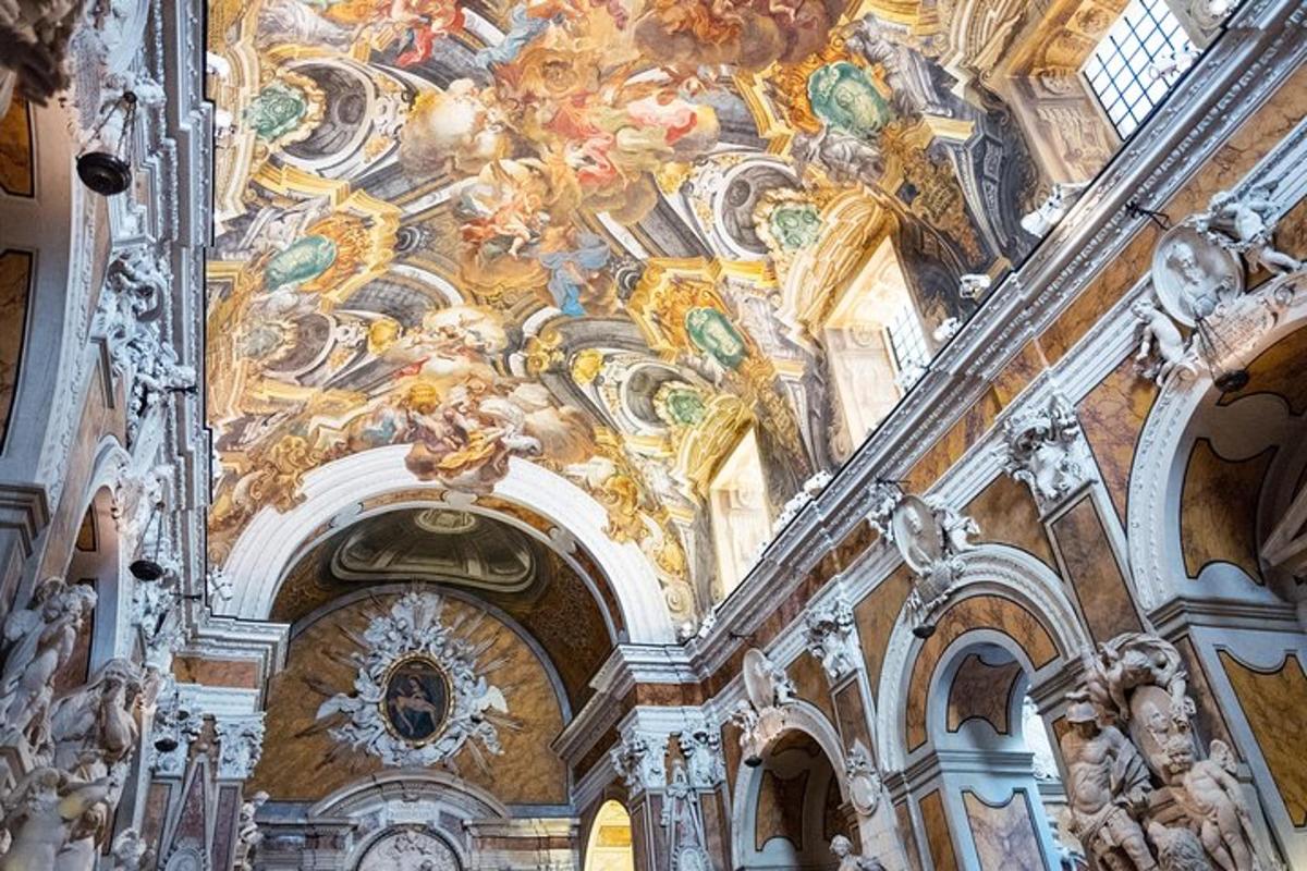 a church with a ceiling covered in paintings