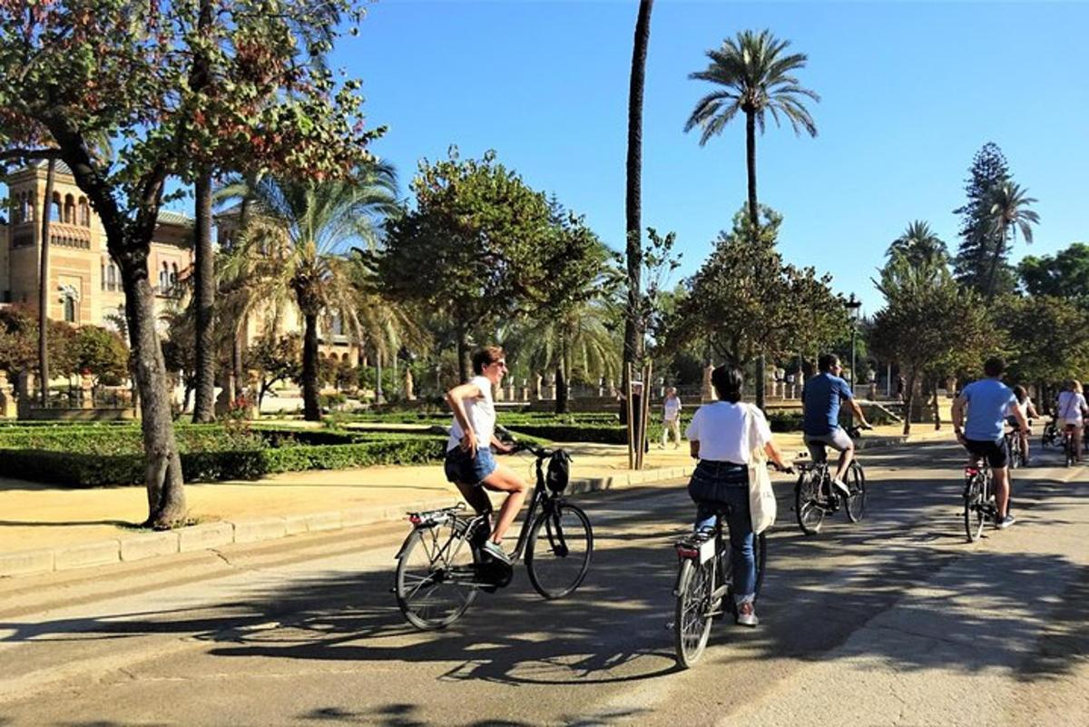 a group of people riding bikes down a street