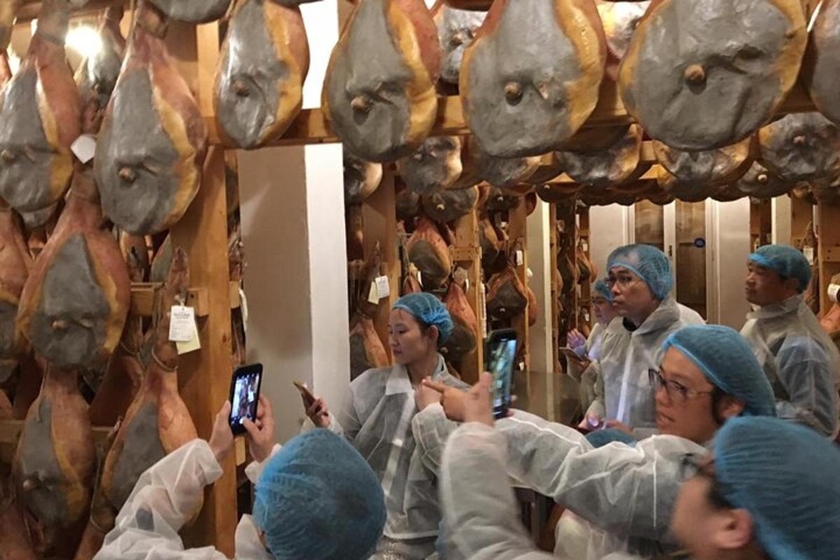 a group of men in turbans taking pictures with their cell phones