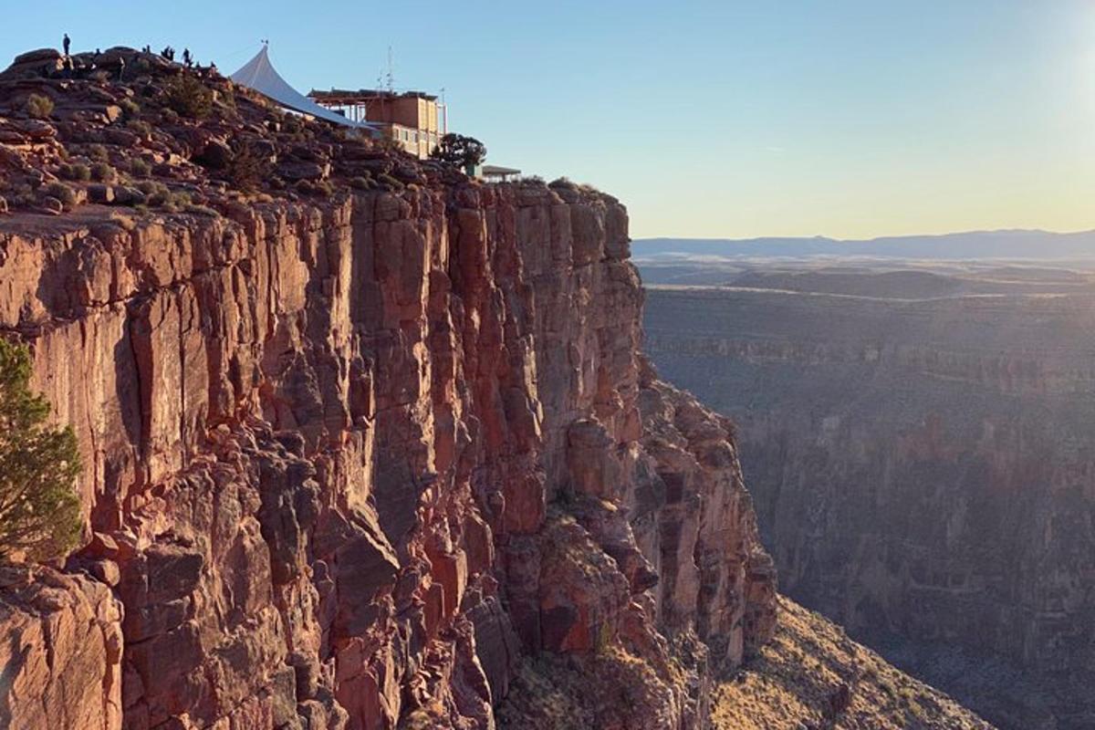 a building on the edge of a mountain