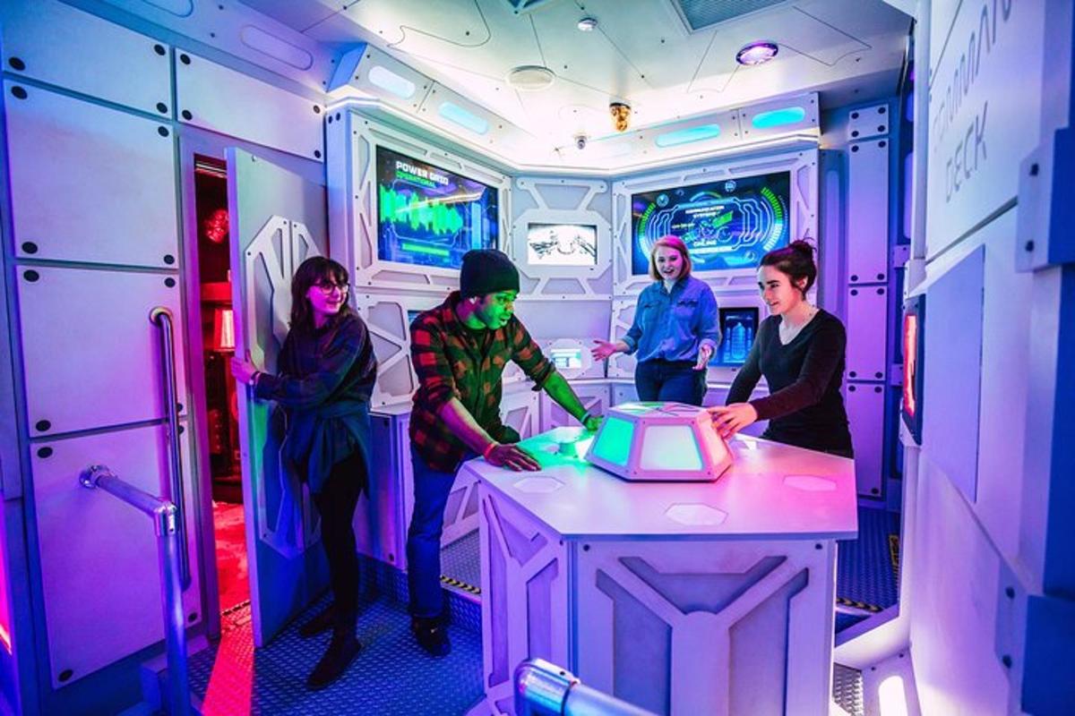 a group of people standing around a table in an rv