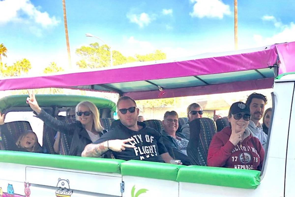 a group of people riding in the back of a bus