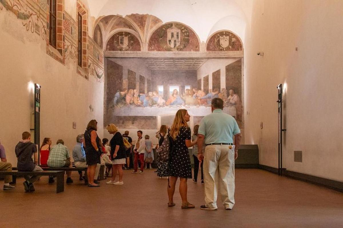 a man and woman looking at a painting in a museum