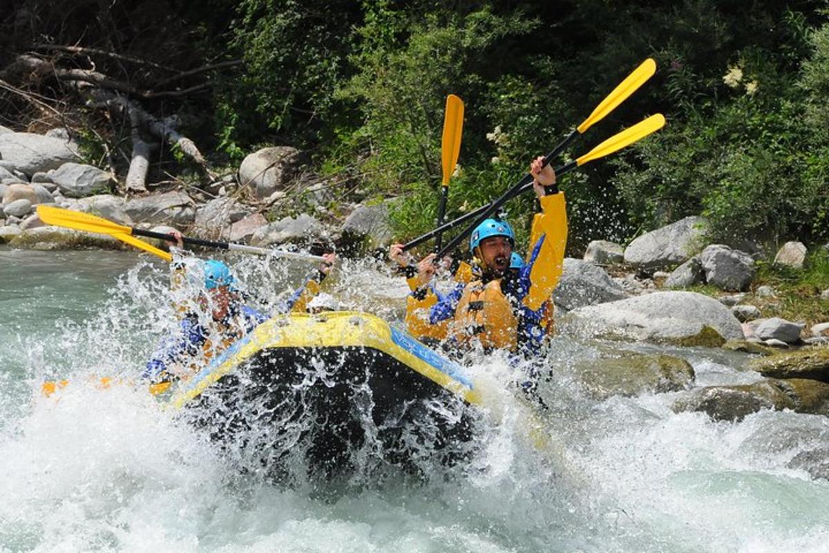 a man is in a raft in the water
