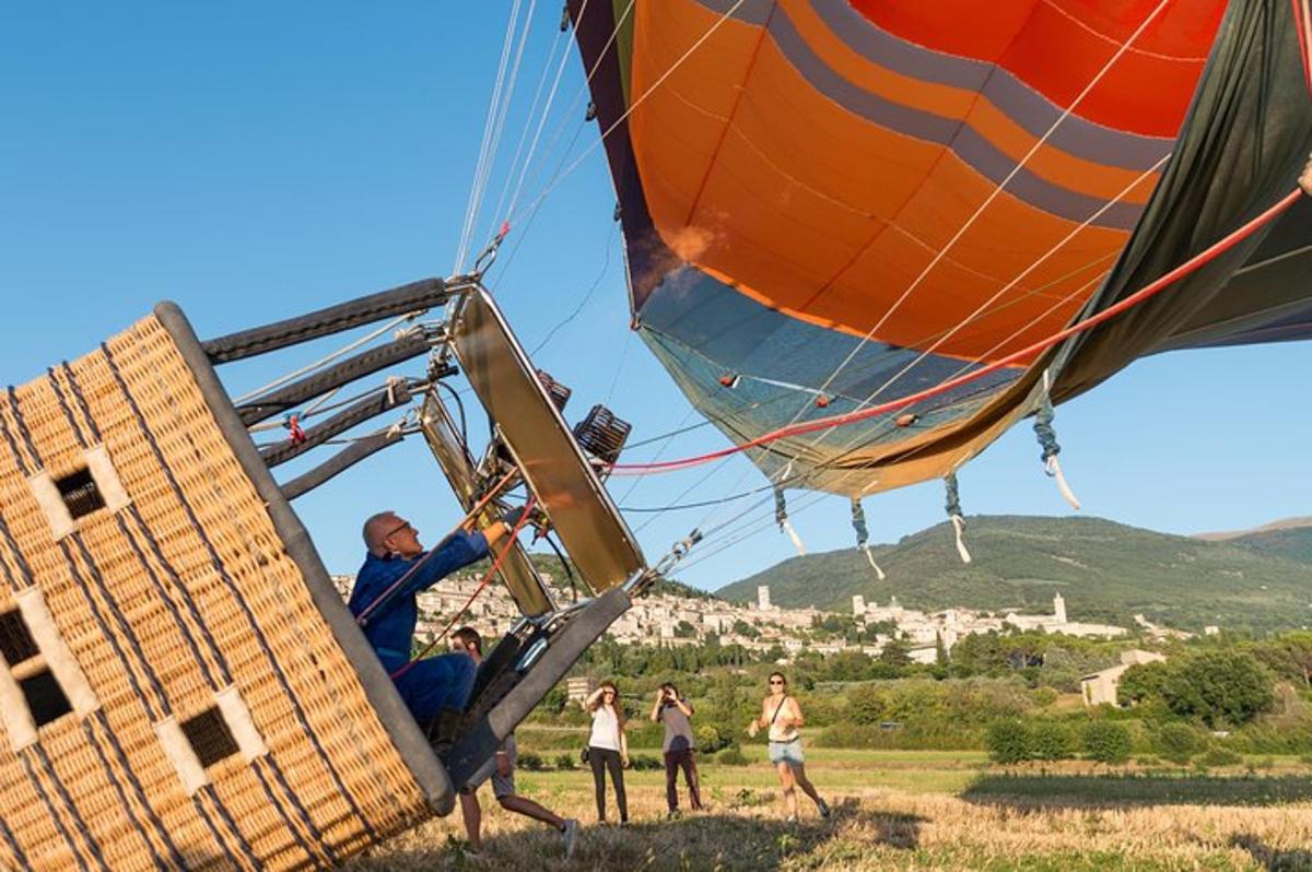 a man is in a hot air balloon with people