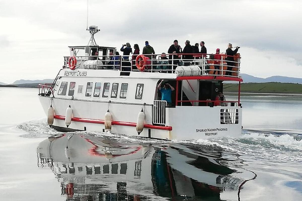 a group of people on a boat on the water
