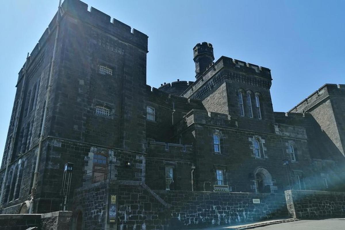 a large brick building with a tower on top