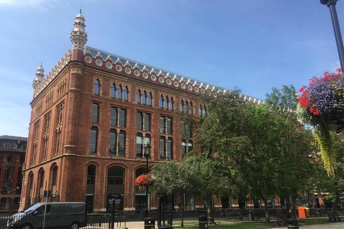 a large brick building with a tower on top of it