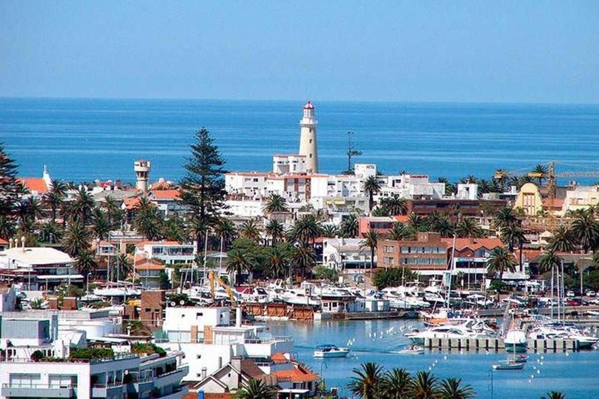 a city with a harbor with boats in the water