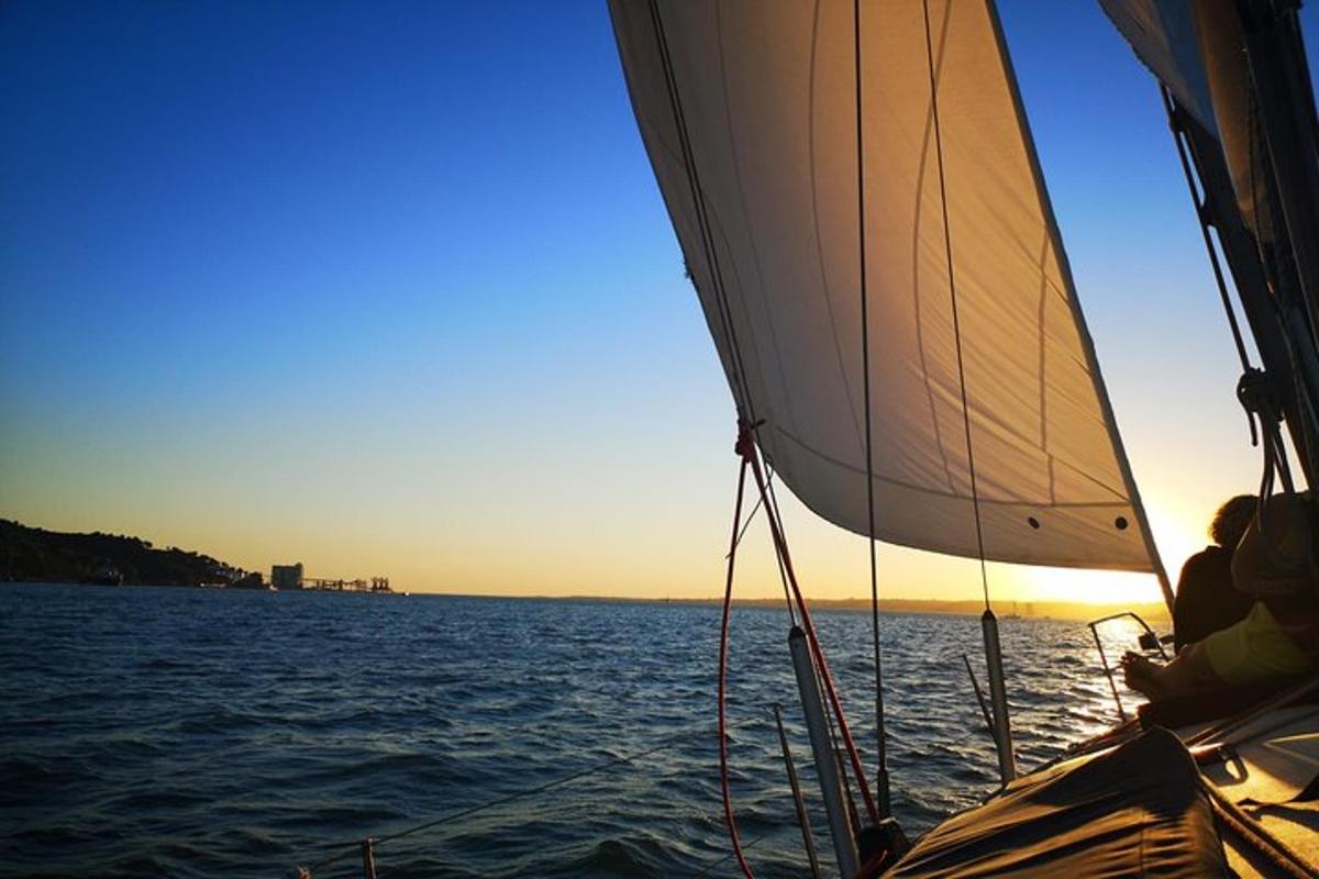 a person on a sail boat in the water