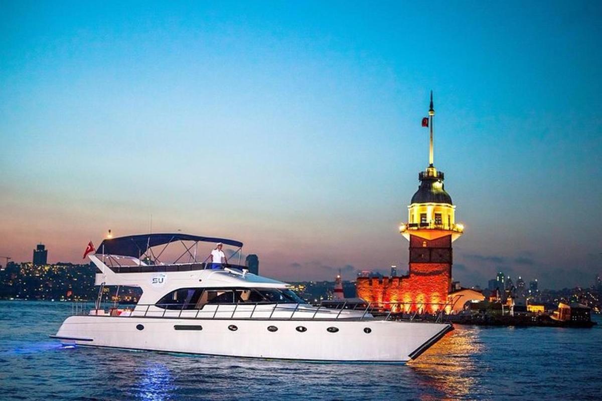 a boat in the water in front of a lighthouse