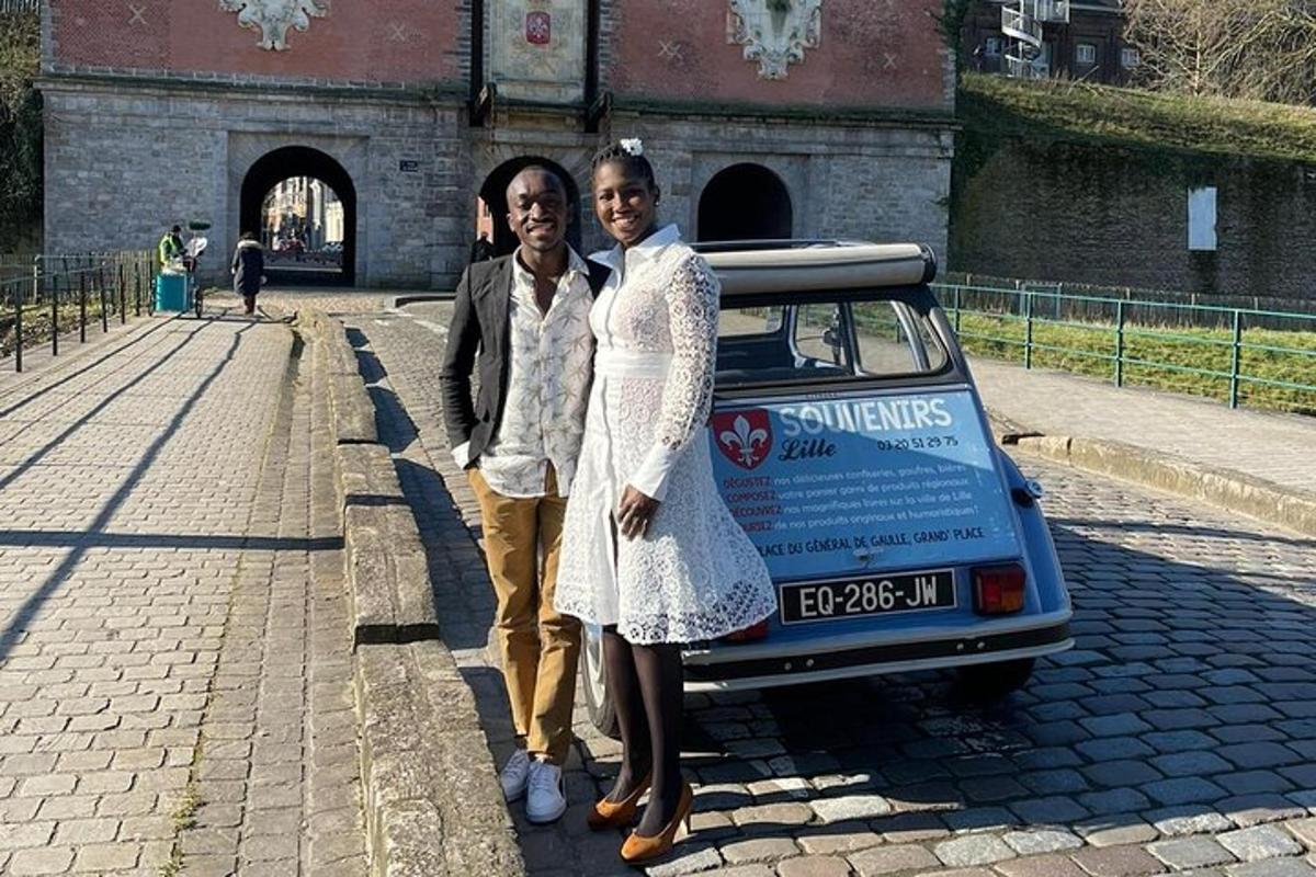 two women are standing next to a car