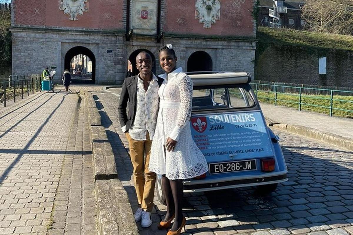 two women are standing in front of a car