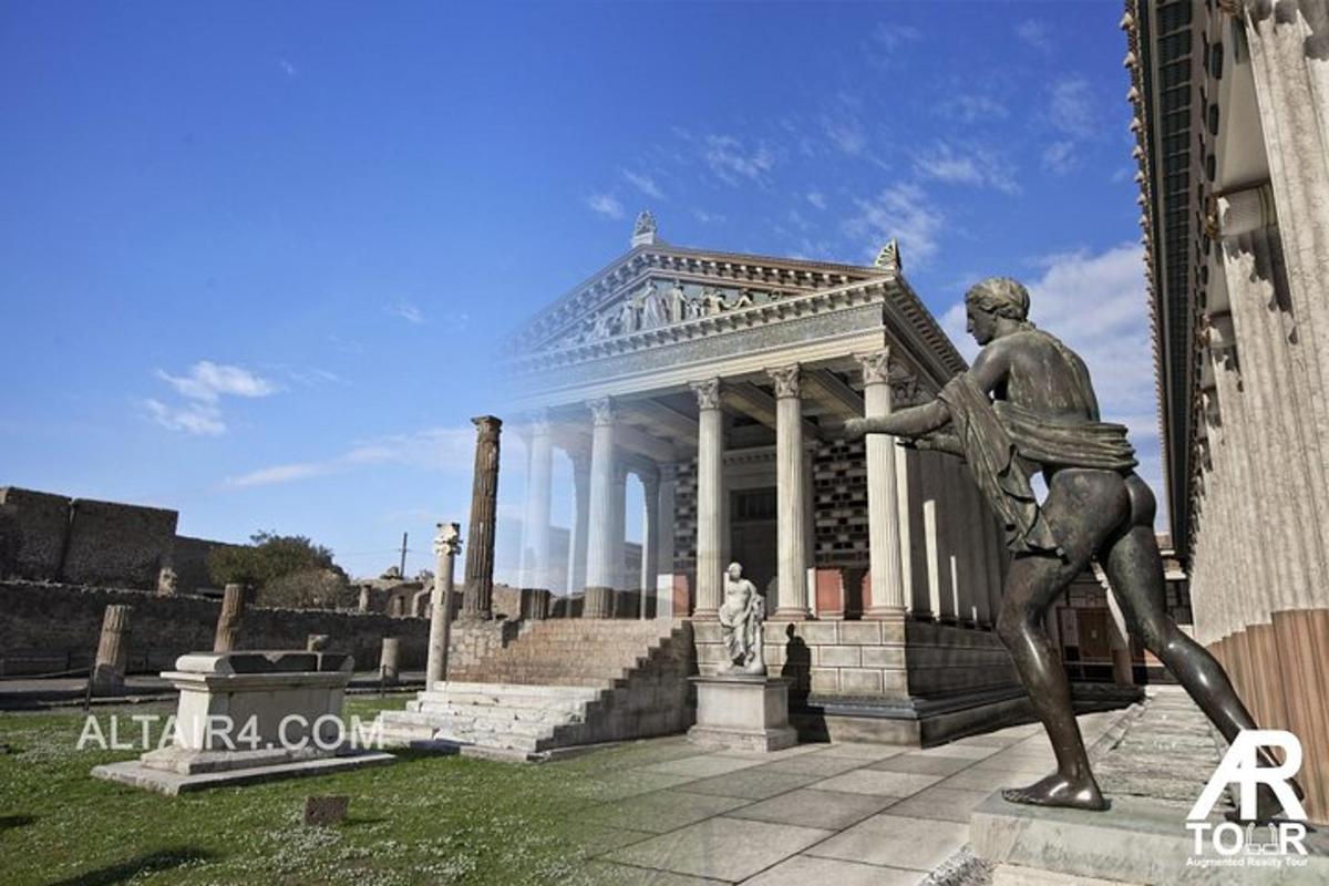 una estàtua d'un home davant d'un edifici