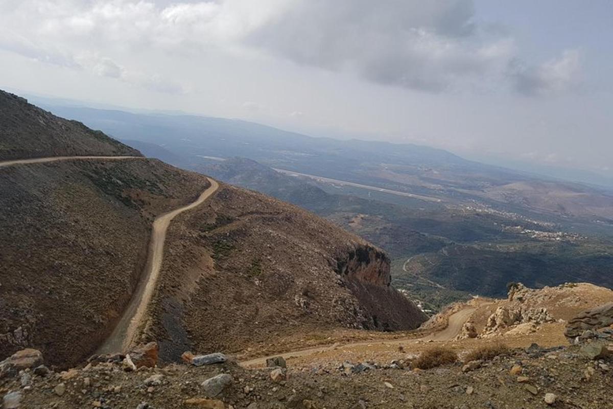a dirt road on the side of a mountain