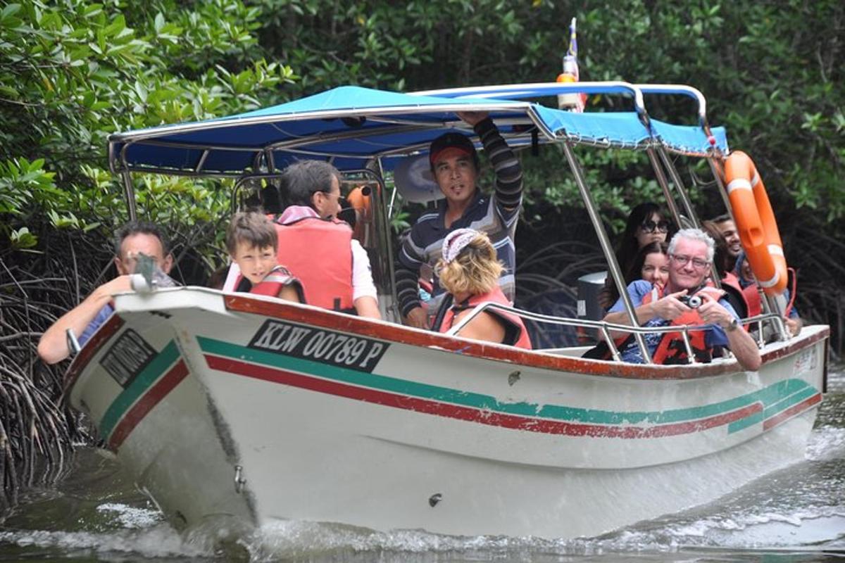 a group of people on a boat in the water